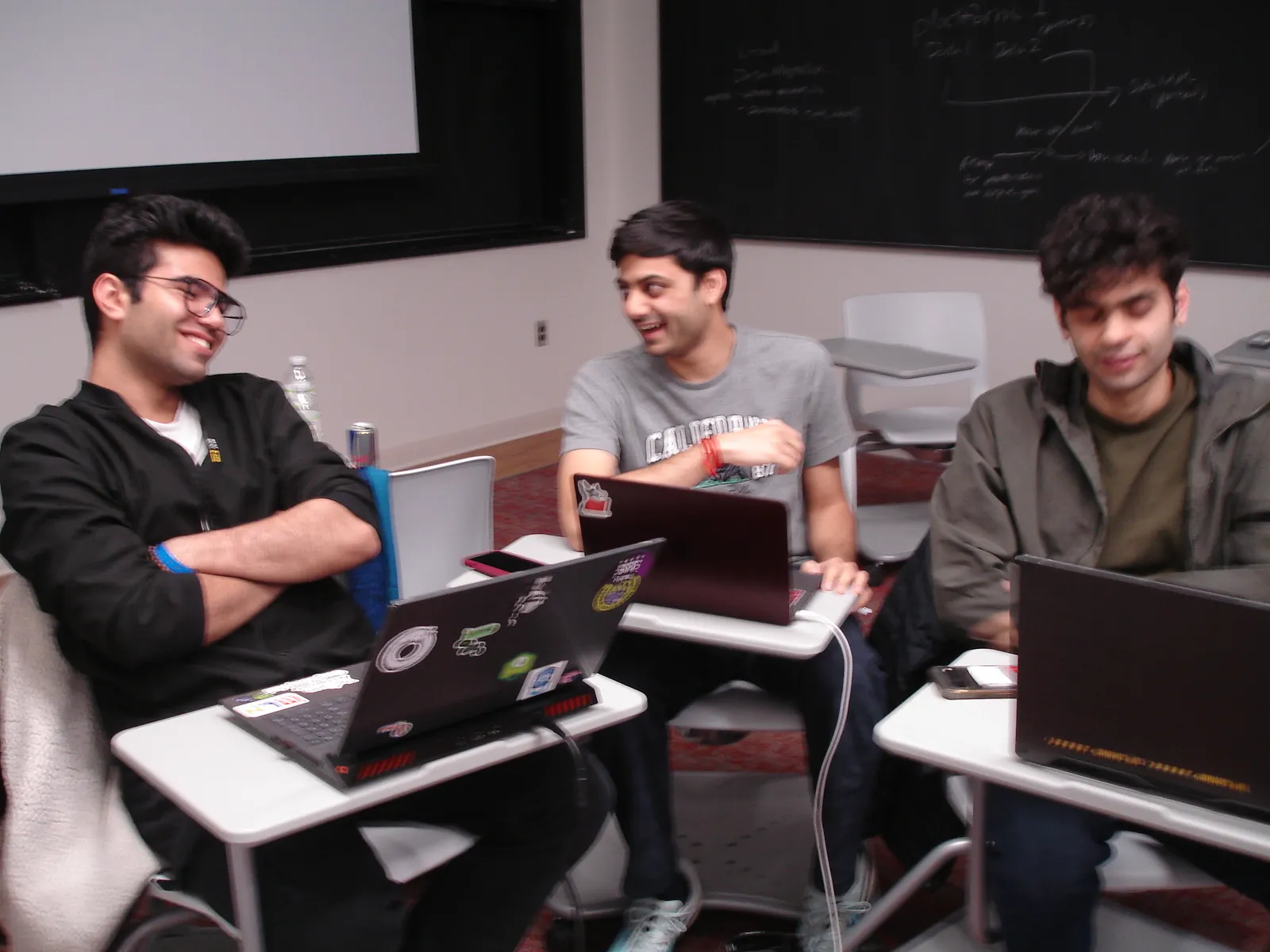 The HiveOps team working at desks during YHack at Yale.